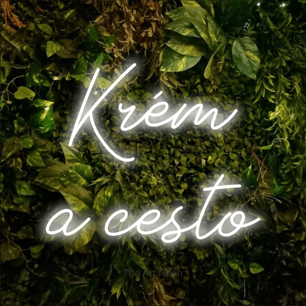 LED neon sign reading “Krém a cesto”, arranged in two lines.