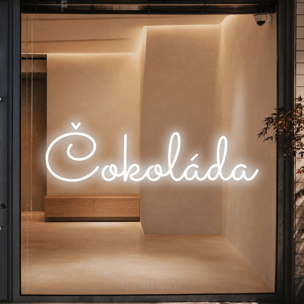 LED neon sign reading “Čokoláda”, arranged in a single line.