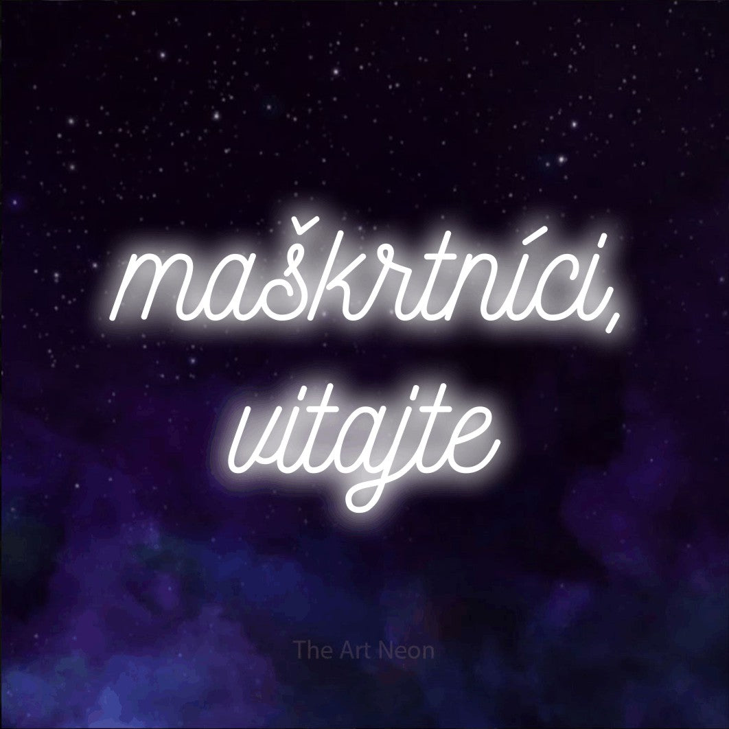 LED neon sign reading “maškrtníci, vitajte”, arranged in two lines.