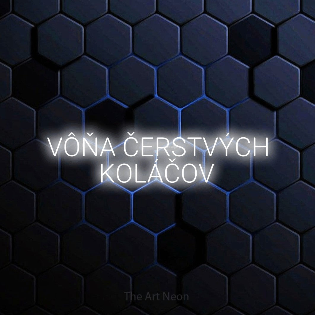 LED neon sign reading “VÔŇA ČERSTVÝCH KOLÁČOV”, arranged in two lines.
