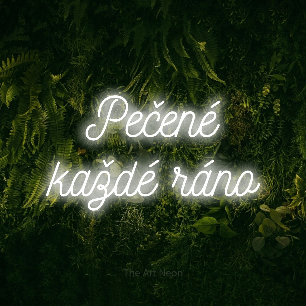 LED neon sign reading “Pečené každé ráno”, arranged in two lines.