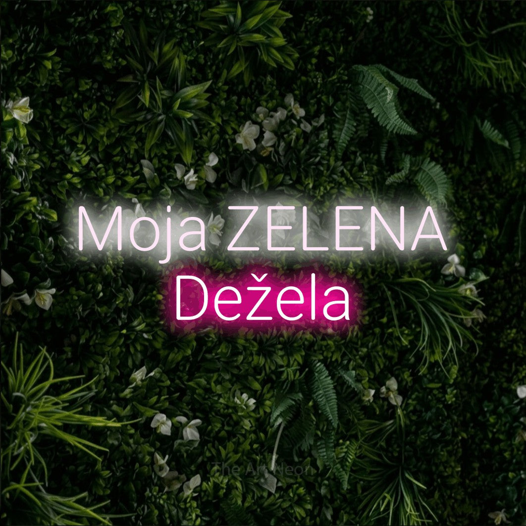 LED neon sign reading “Moja ZELENA Dežela”, arranged in two lines.