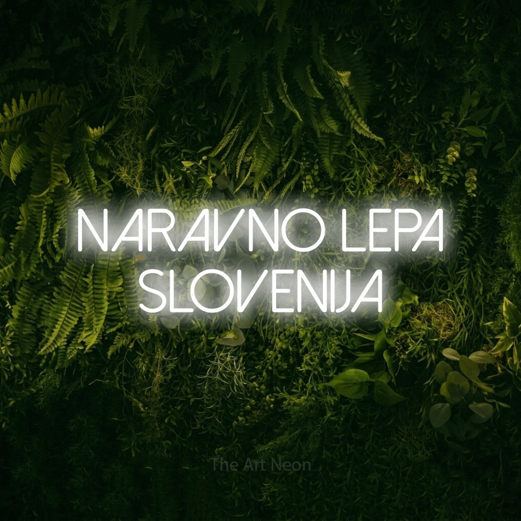 LED neon sign reading “naravno lepa slovenija”, arranged in two lines.