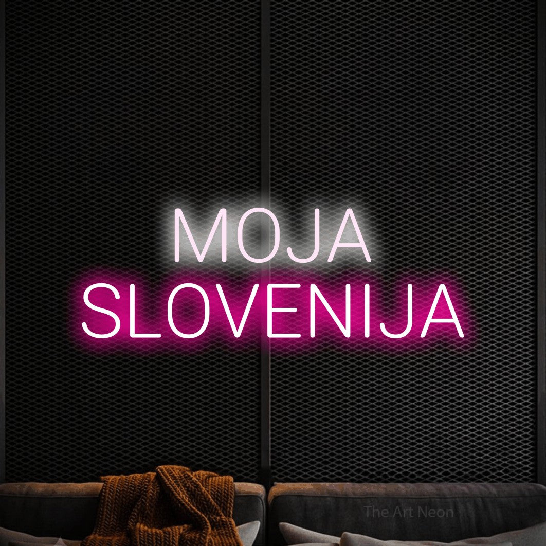 LED neon sign reading “MOJA SLOVENIJA”, arranged in two lines.