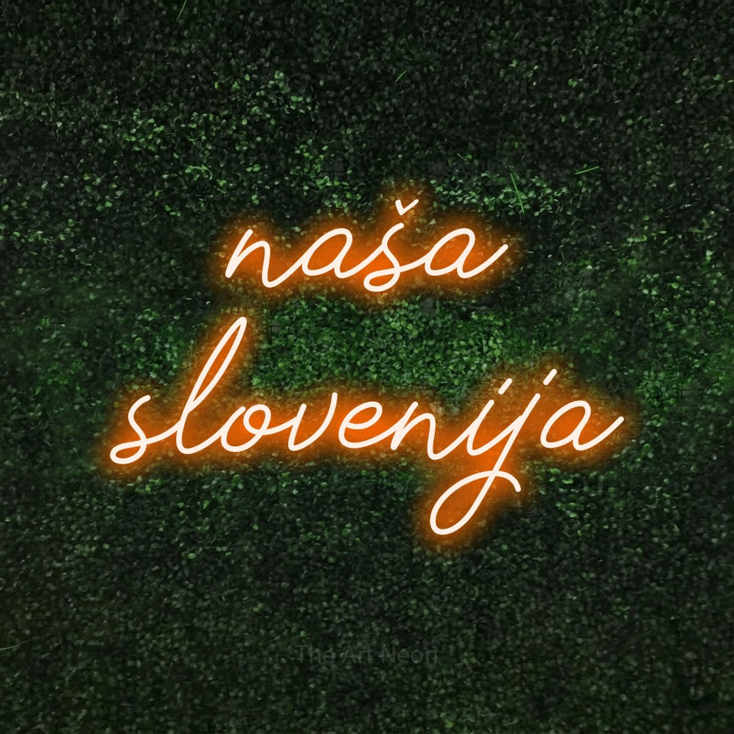 LED neon sign reading “naša slovenija”, arranged in two lines.