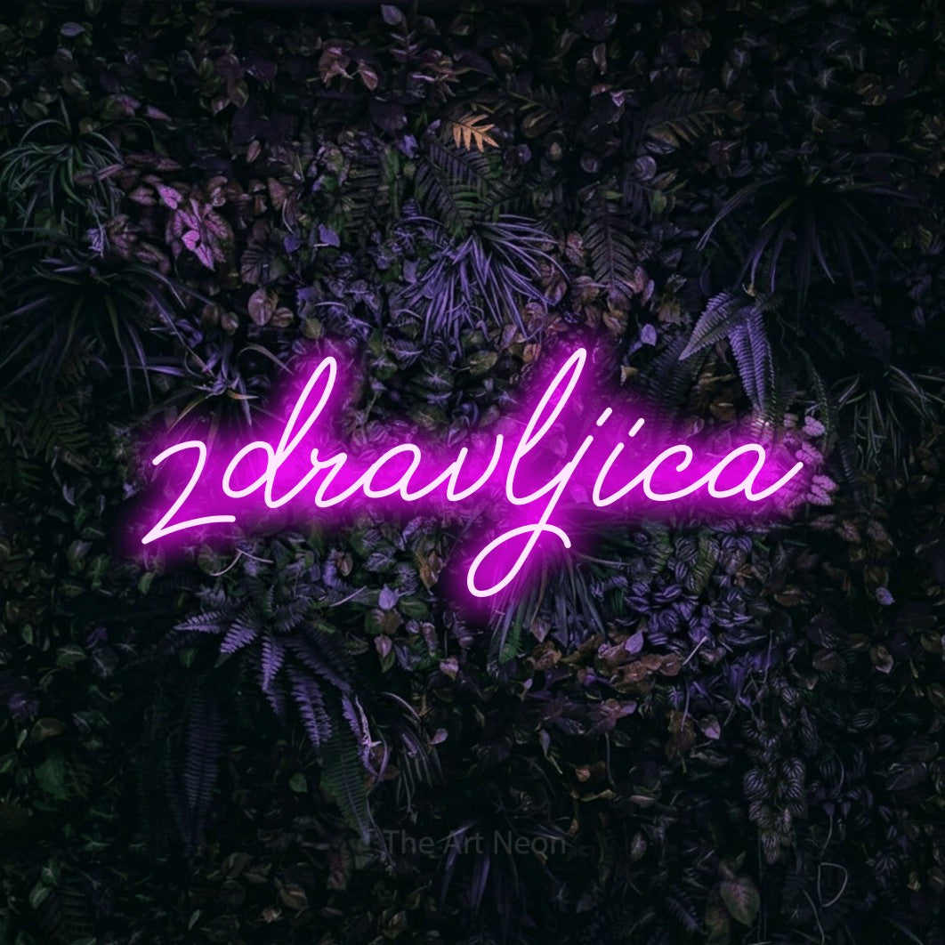 LED neon sign reading “zdravljica”, arranged in a single line.
