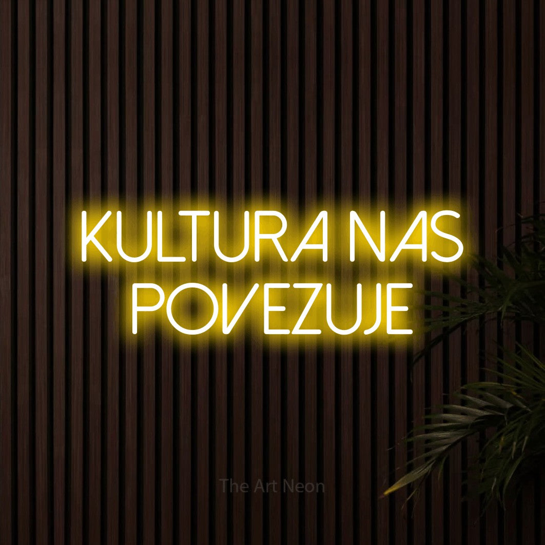 LED neon sign reading “kultura nas povezuje”, arranged in two lines.
