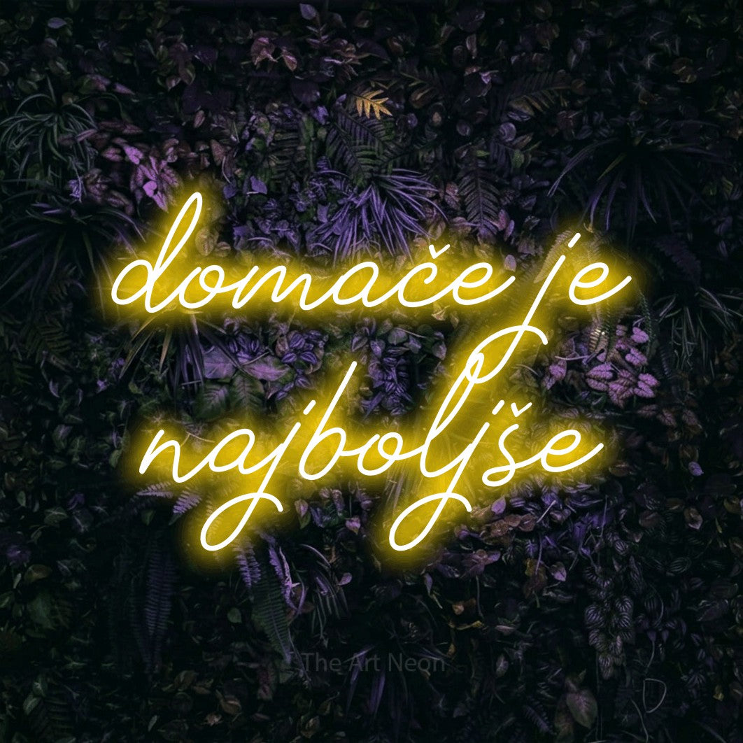 LED neon sign reading “domače je najboljše”, arranged in two lines.