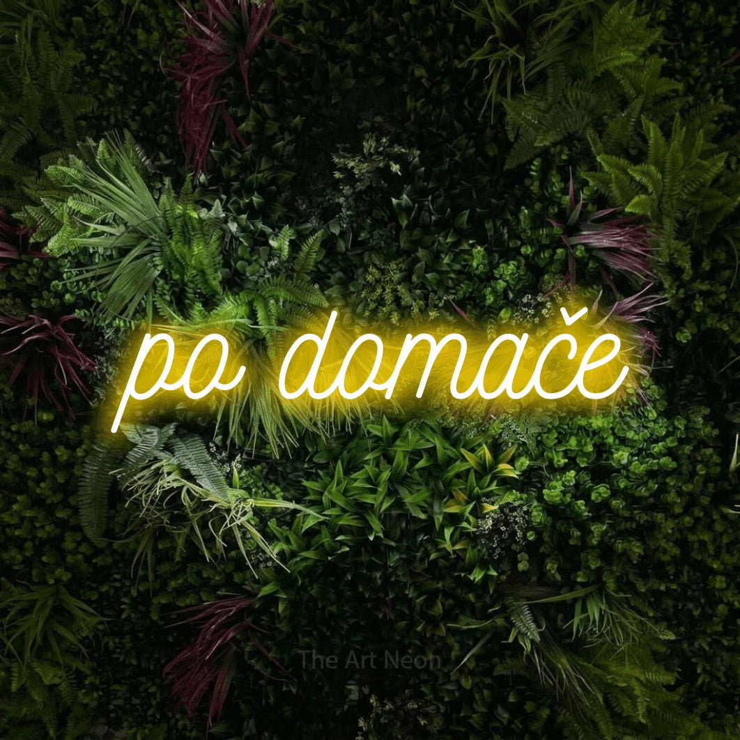 LED neon sign reading “po domače”, arranged in a single line.