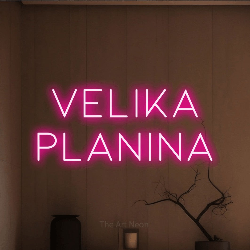LED neon sign reading “velika planina”, arranged in two lines.