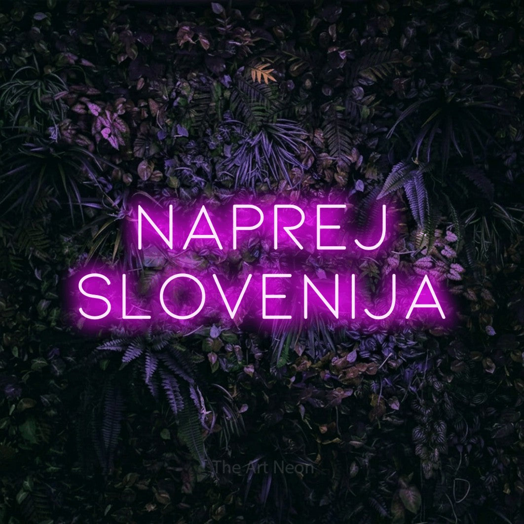 LED neon sign reading “NAPREJ SLOVENIJA”, arranged in two lines.