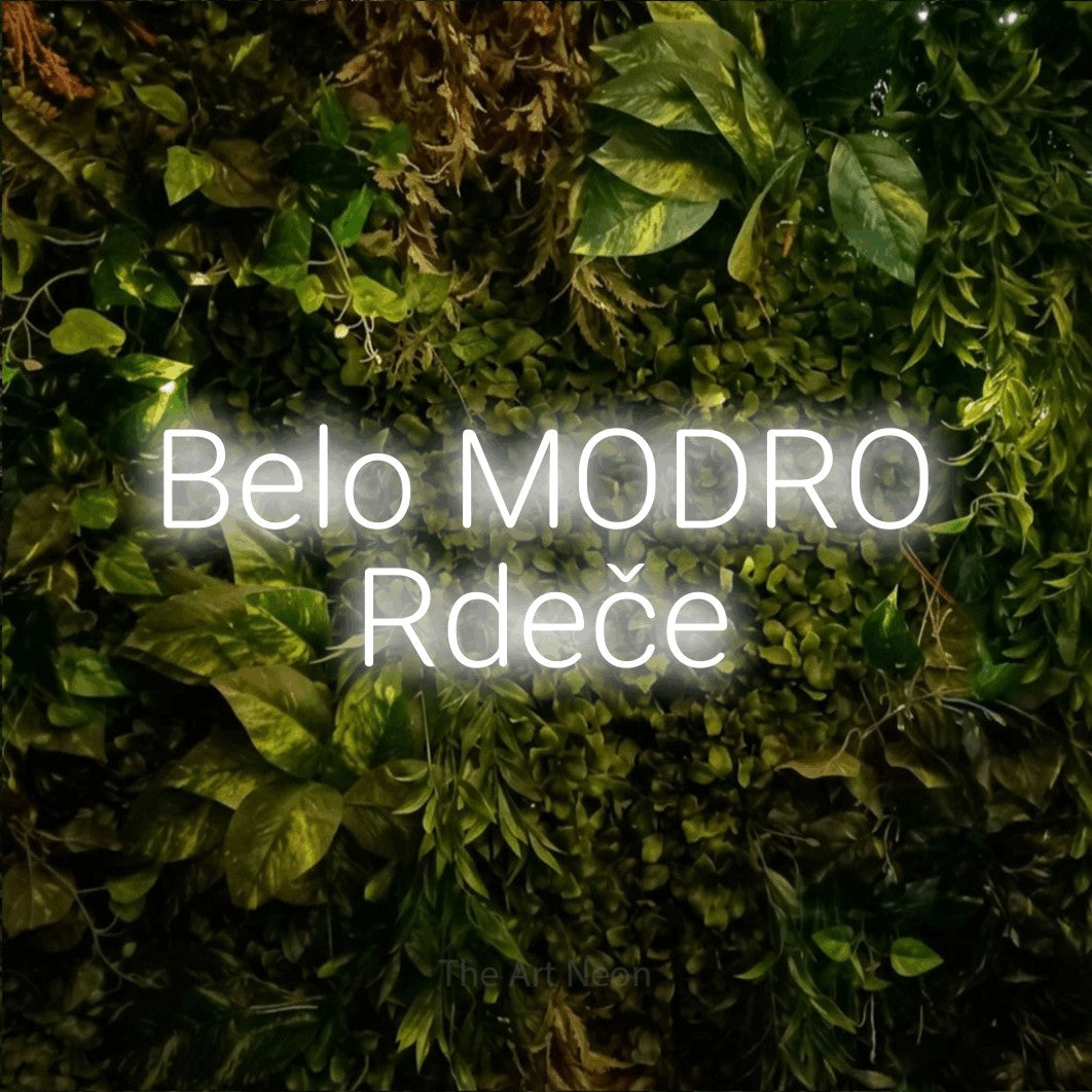 LED neon sign reading “Belo MODRO Rdeče”, arranged in two lines.