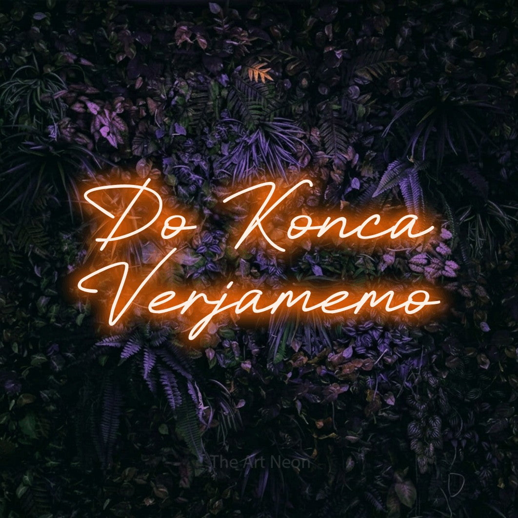LED neon sign reading “Do Konca Verjamemo”, arranged in two lines.