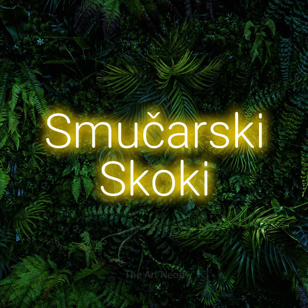 LED neon sign reading “Smučarski Skoki”, arranged in two lines.