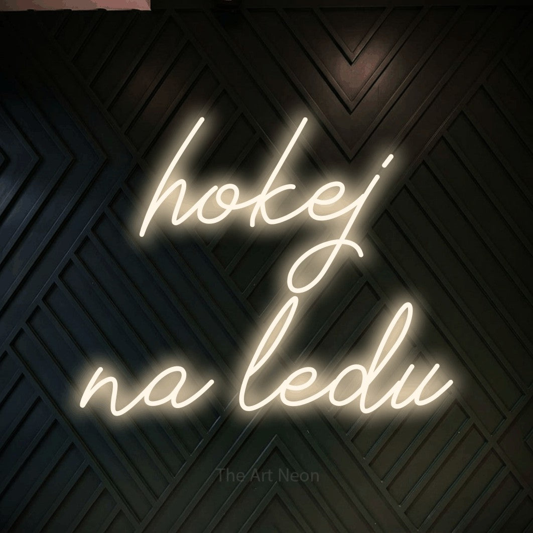 LED neon sign reading “hokej na ledu”, arranged in two lines.