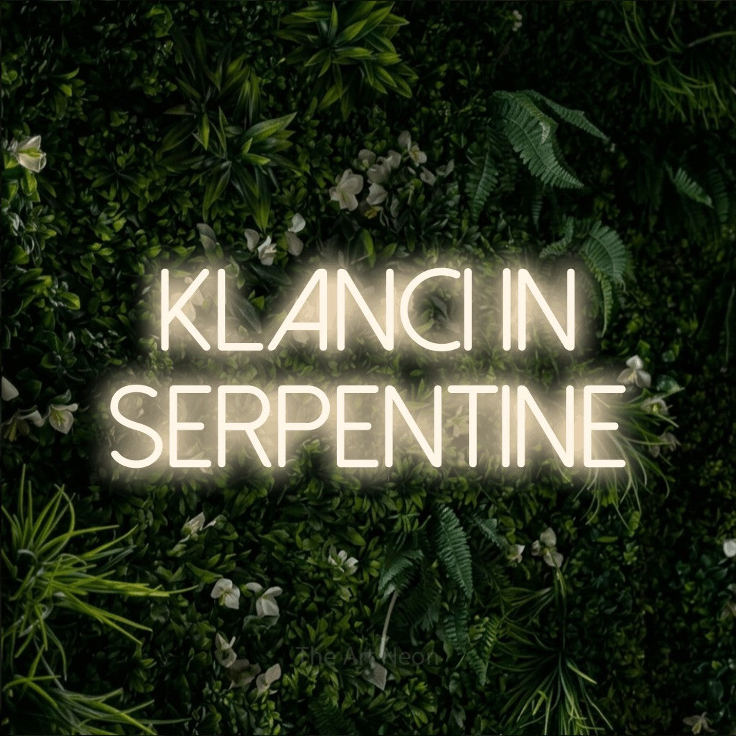 LED neon sign reading “klanci in serpentine”, arranged in two lines.