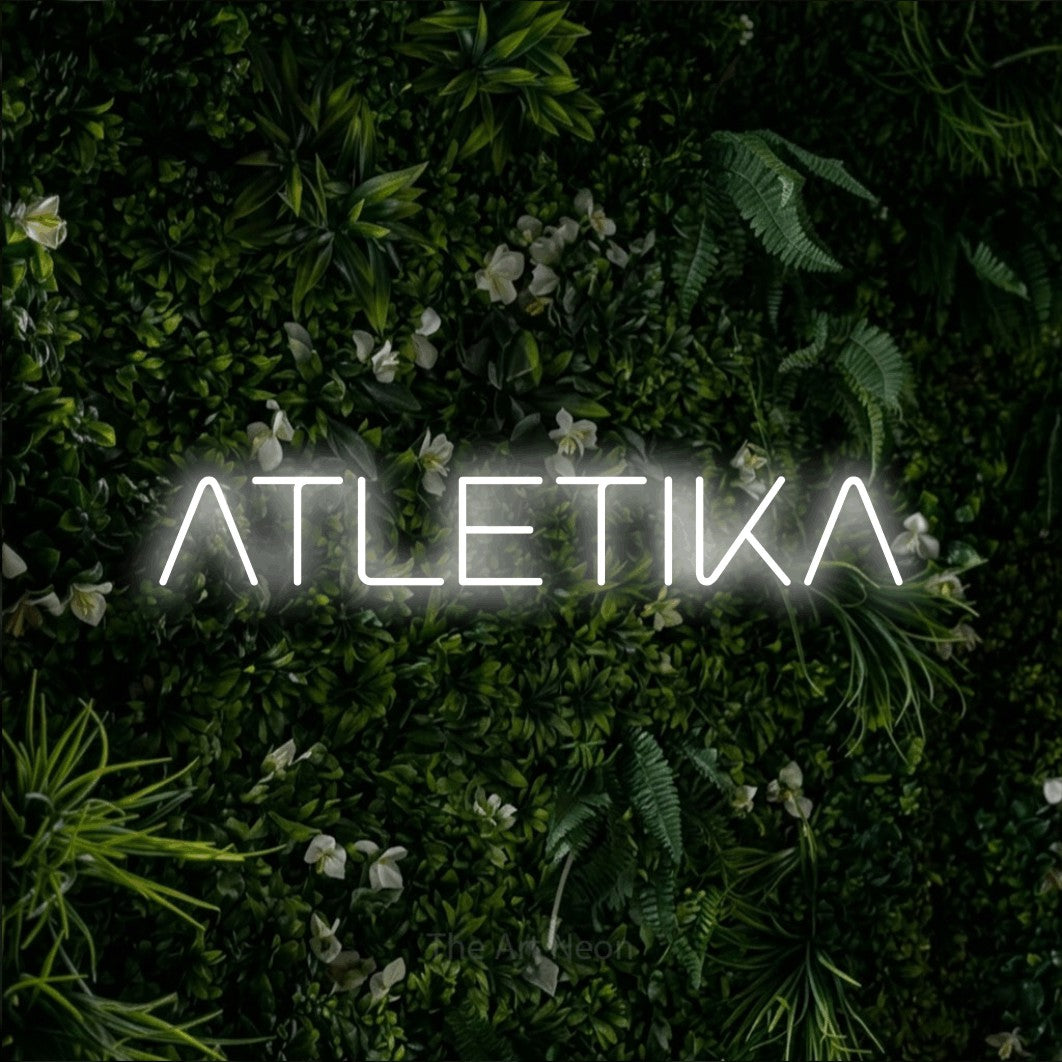 LED neon sign reading “ATLETIKA”, arranged in a single line.