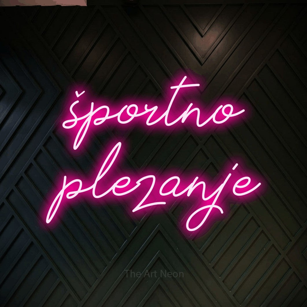 LED neon sign reading “športno plezanje”, arranged in two lines.