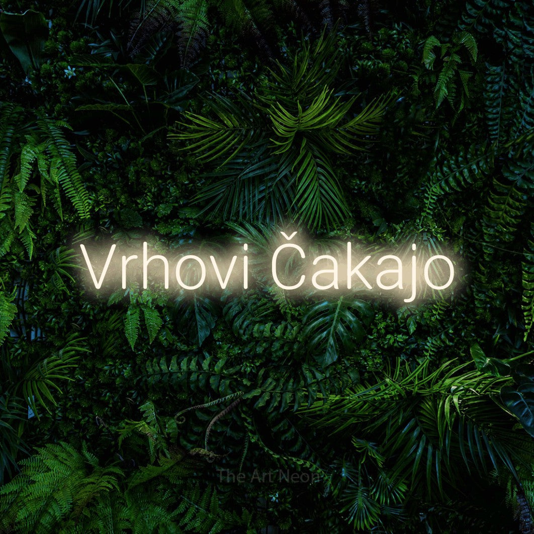 LED neon sign reading “Vrhovi Čakajo”, arranged in a single line.