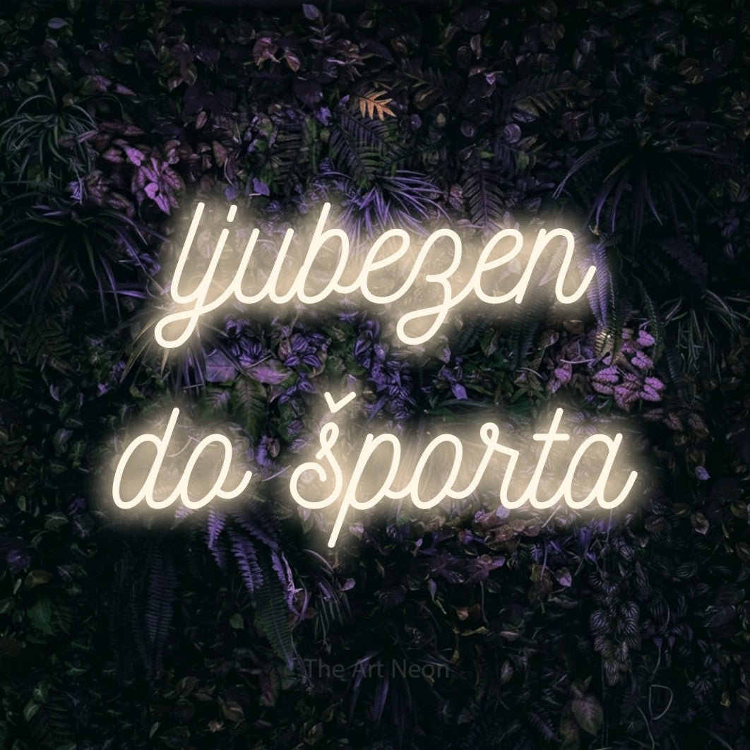 LED neon sign reading “ljubezen do športa”, arranged in two lines.