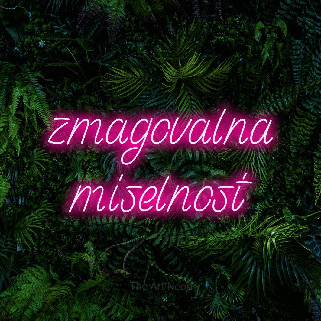 LED neon sign reading “zmagovalna miselnost”, arranged in two lines.