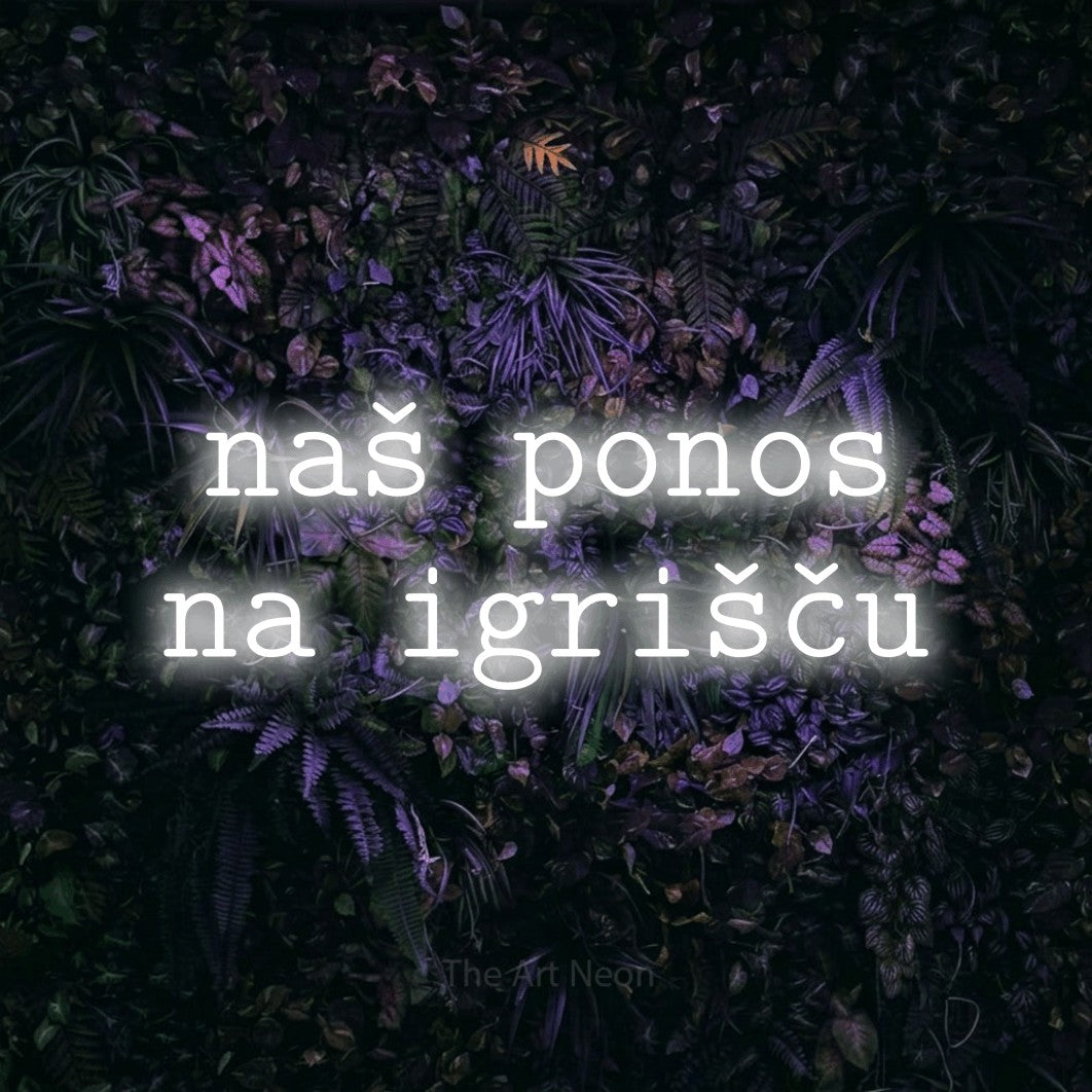 LED neon sign reading “naš ponos na igrišču”, arranged in two lines.