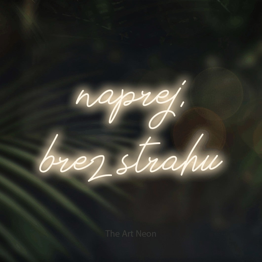 LED neon sign reading “naprej, brez strahu”, arranged in two lines.