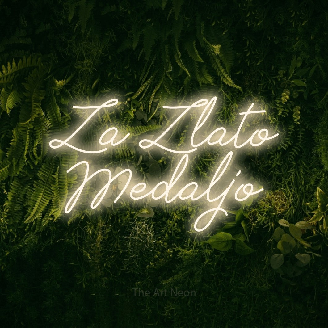 LED neon sign reading “Za Zlato Medaljo”, arranged in two lines.
