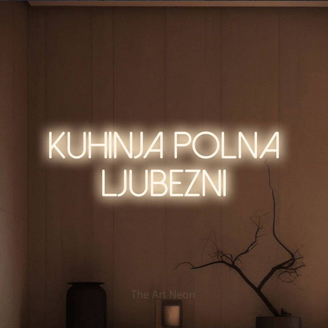 LED neon sign reading “KUHINJA POLNA LJUBEZNI”, arranged in two lines.