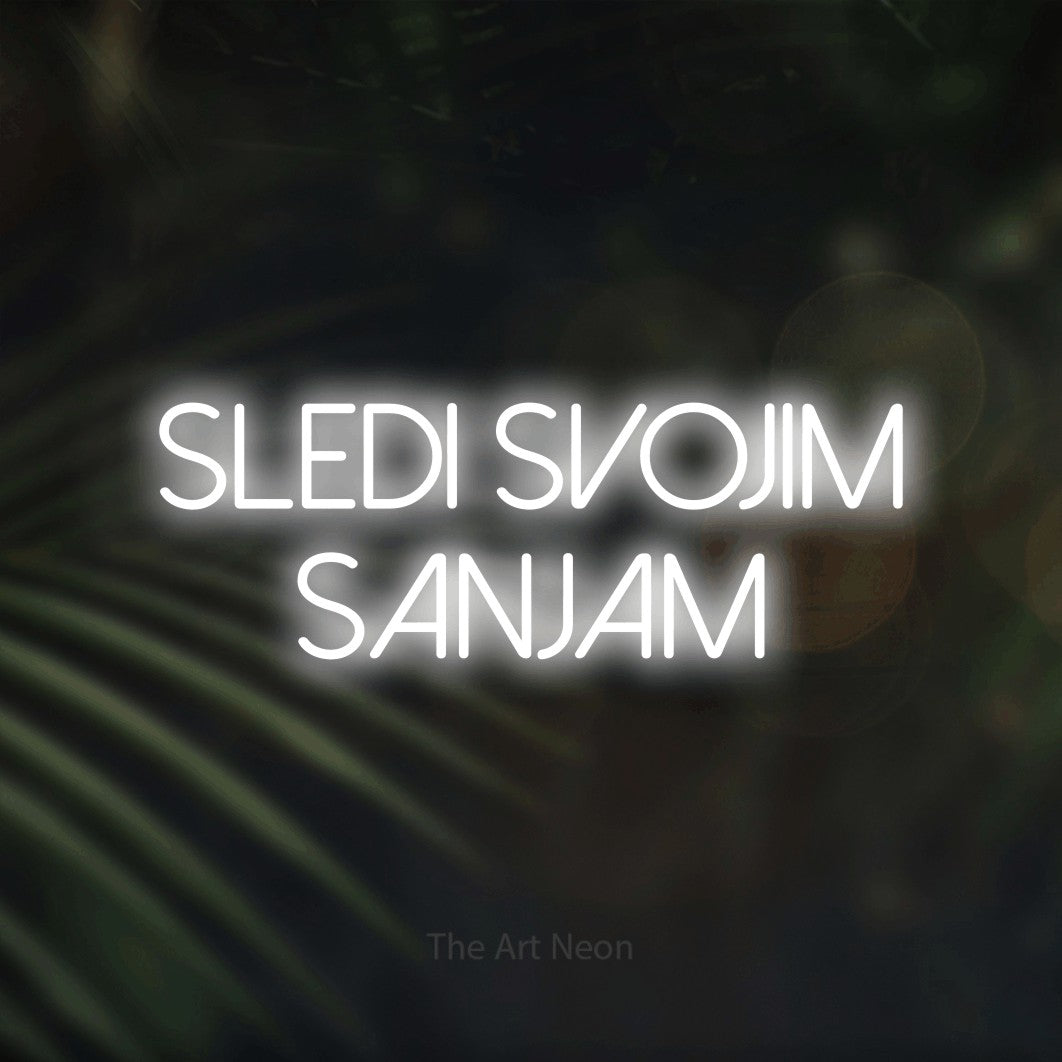 LED neon sign reading “SLEDI SVOJIM SANJAM”, arranged in two lines.