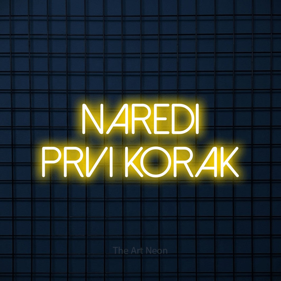 LED neon sign reading “NAREDI PRVI KORAK”, arranged in two lines.