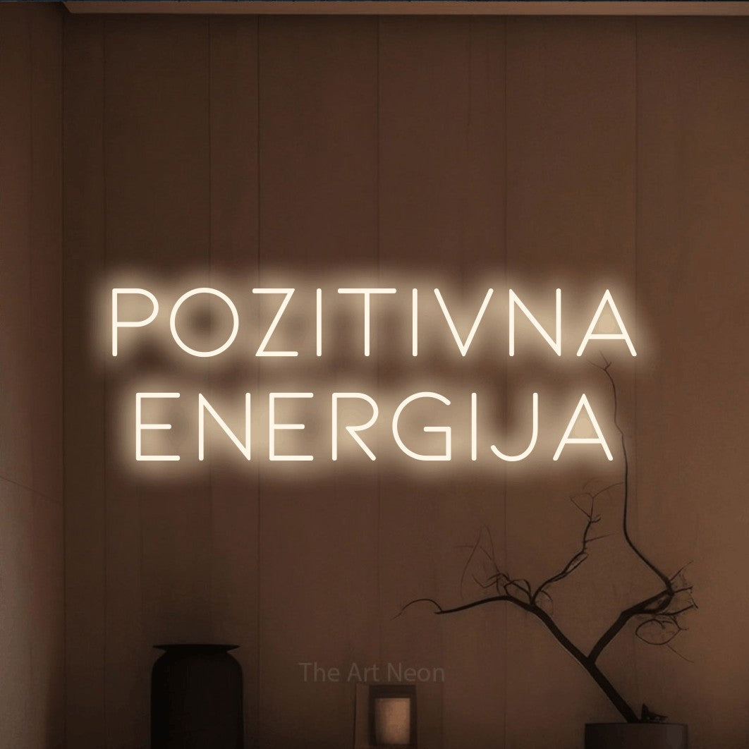 LED neon sign reading “POZITIVNA ENERGIJA”, arranged in two lines.