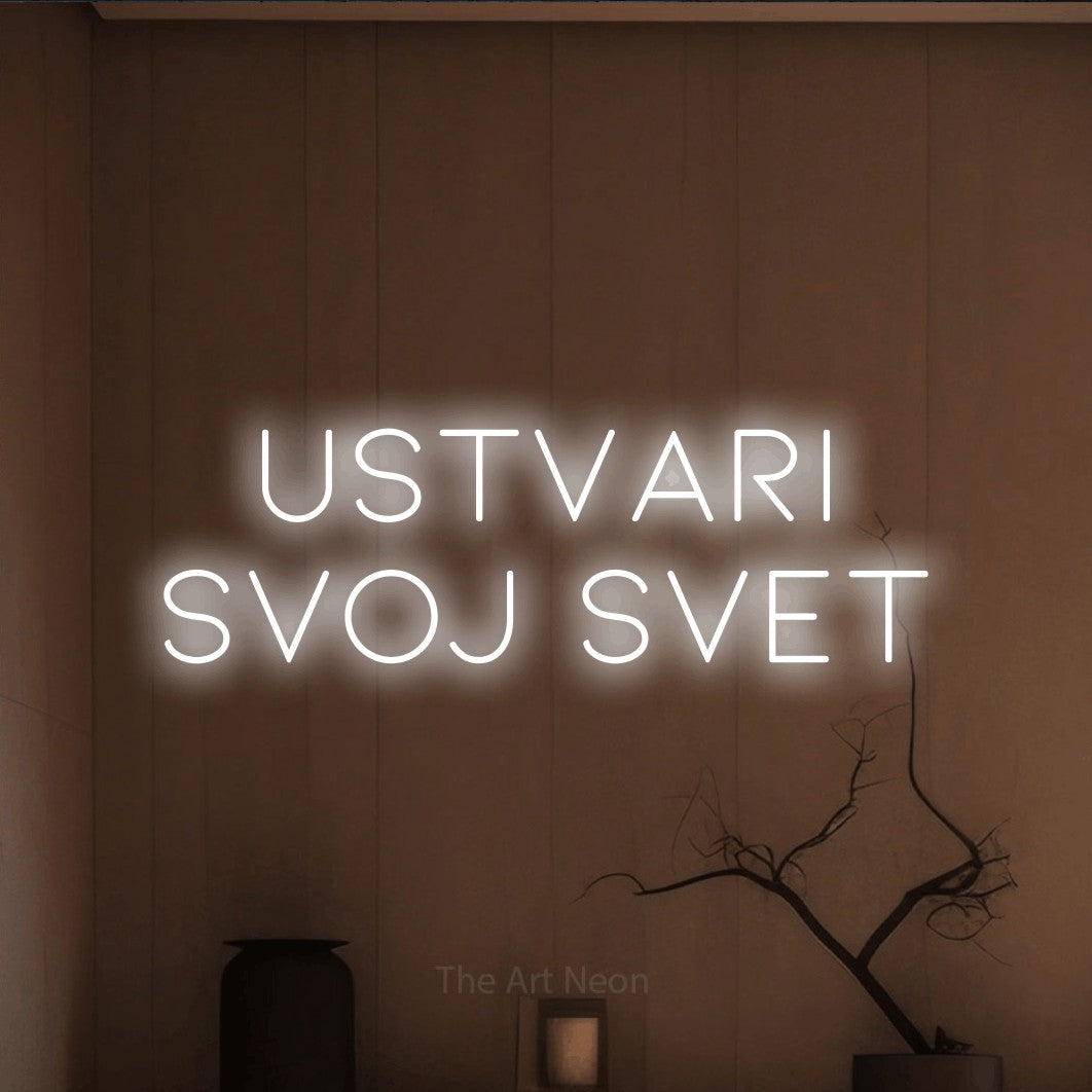 LED neon sign reading “USTVARI SVOJ SVET”, arranged in two lines.