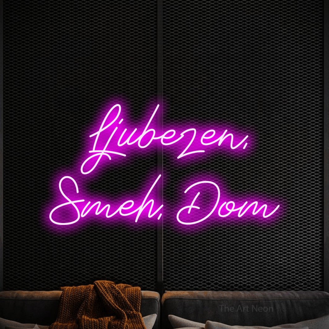 LED neon sign reading “Ljubezen, Smeh, Dom”, arranged in two lines.