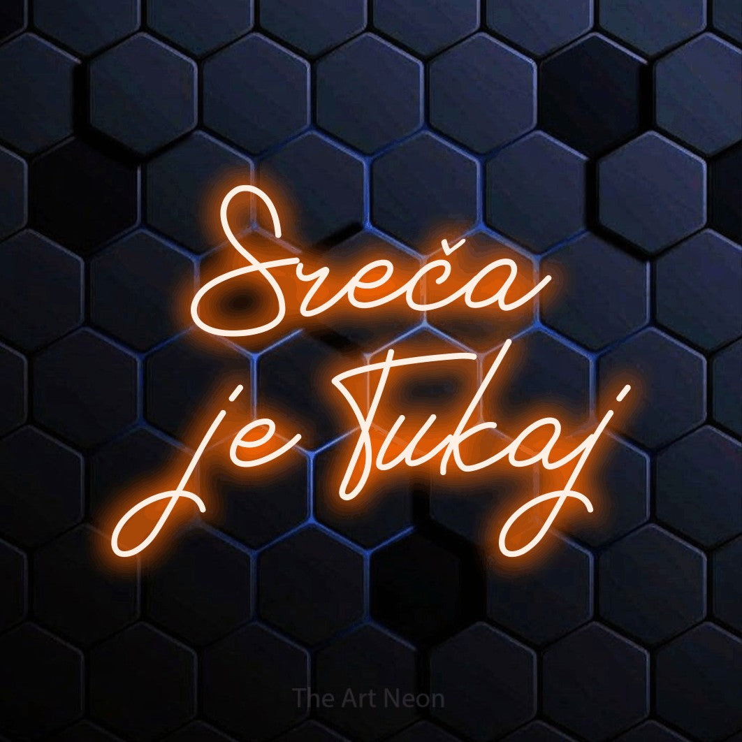 LED neon sign reading “Sreča je Tukaj”, arranged in two lines.