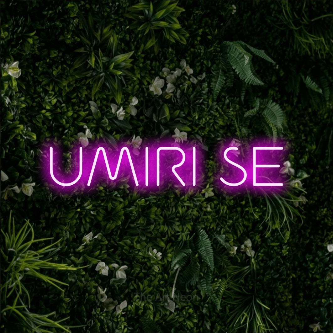 LED neon sign reading “UMIRI SE”, arranged in a single line.