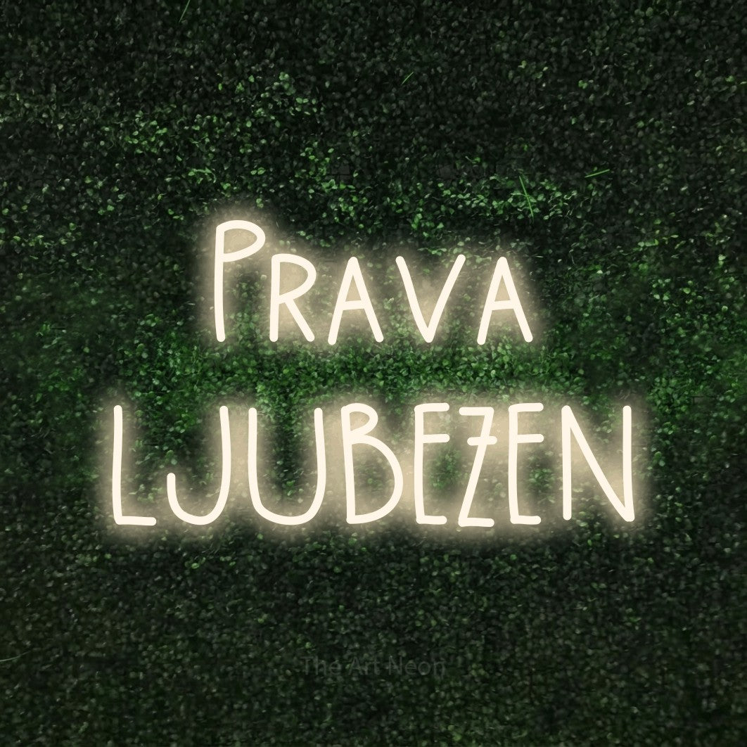 LED neon sign reading “Prava LJUBEZEN”, arranged in two lines.
