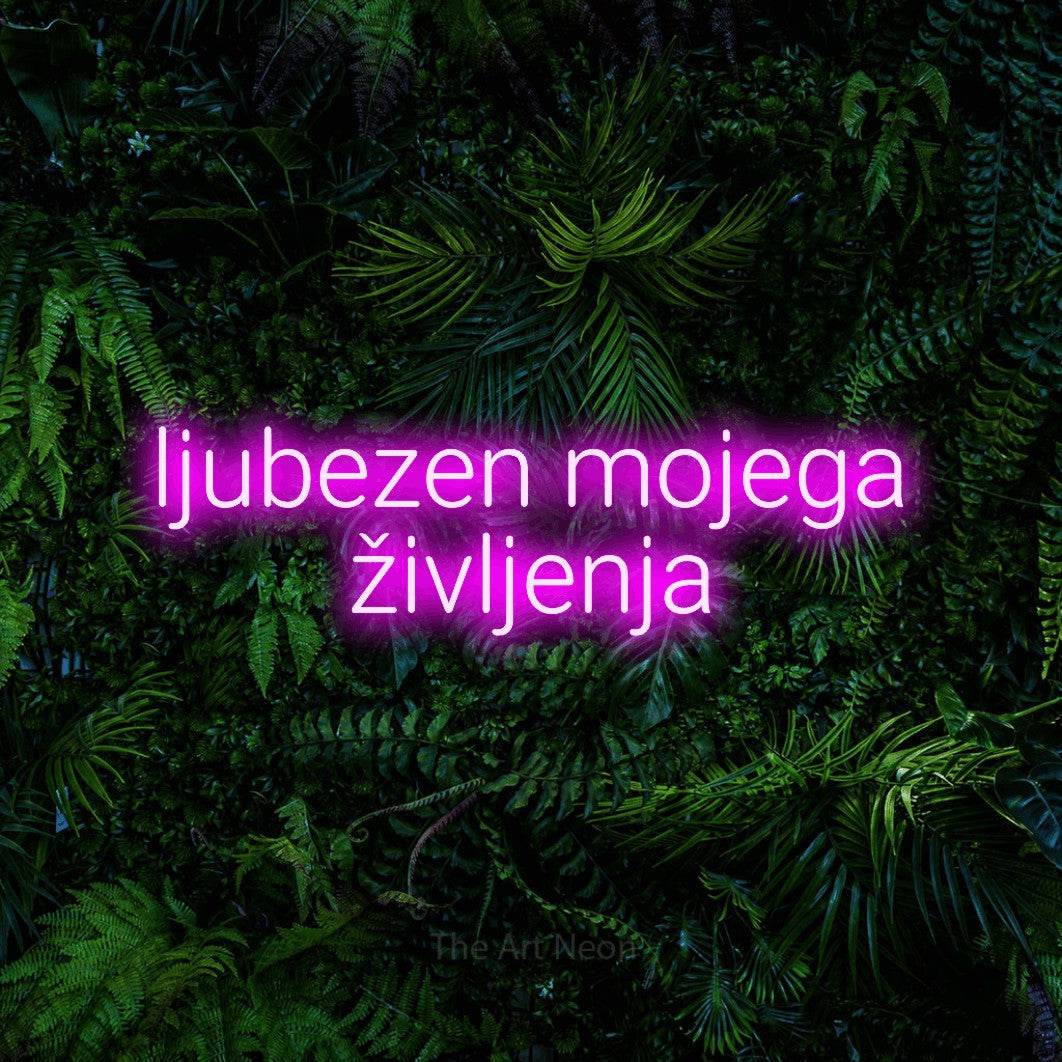 LED neon sign reading “ljubezen mojega življenja”, arranged in two lines.