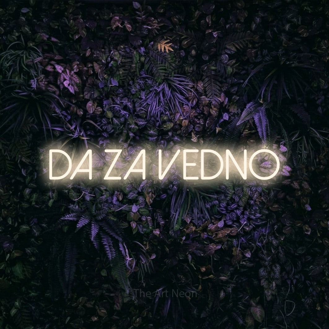 LED neon sign reading “DA ZA VEDNO”, arranged in a single line.