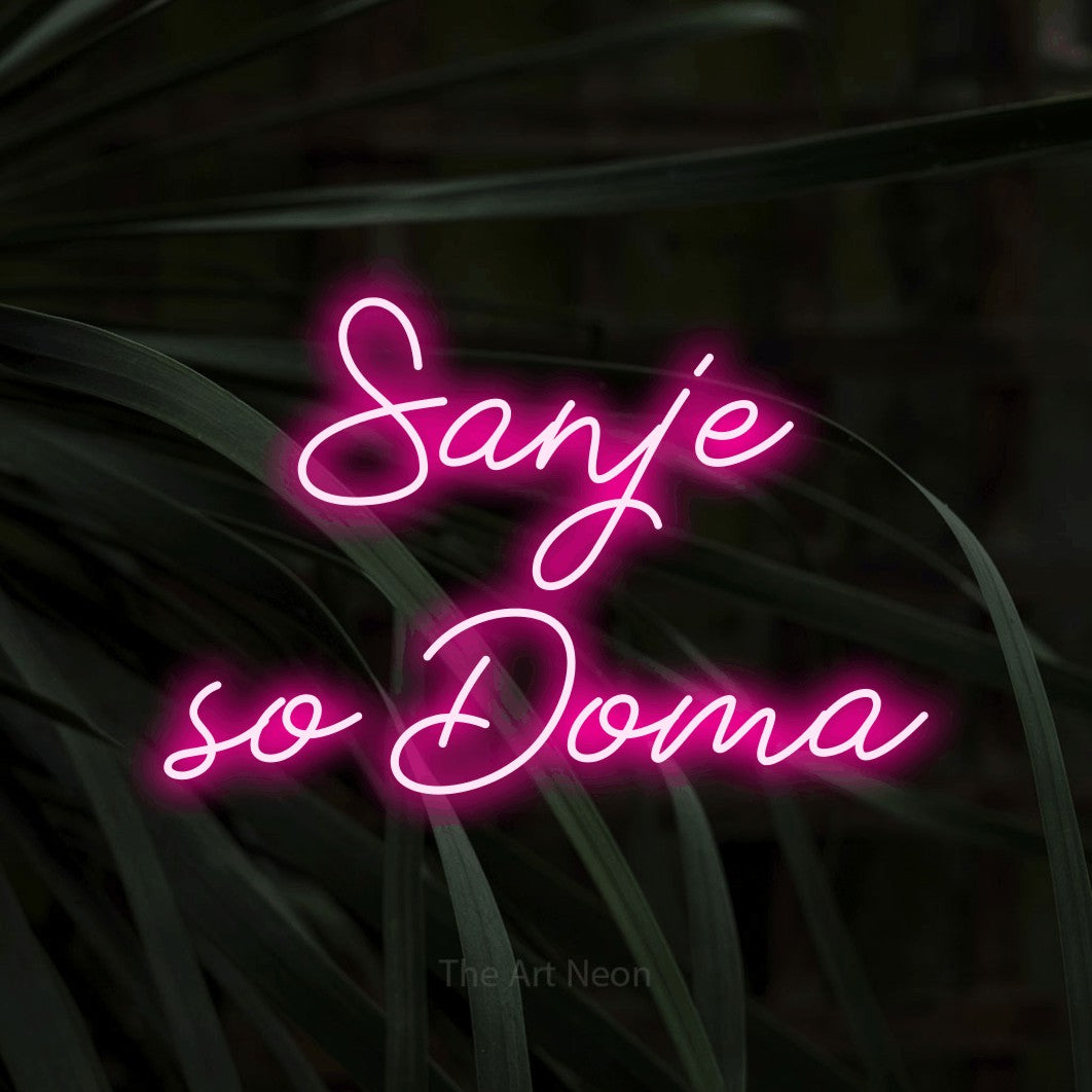 LED neon sign reading “Sanje so Doma”, arranged in two lines.