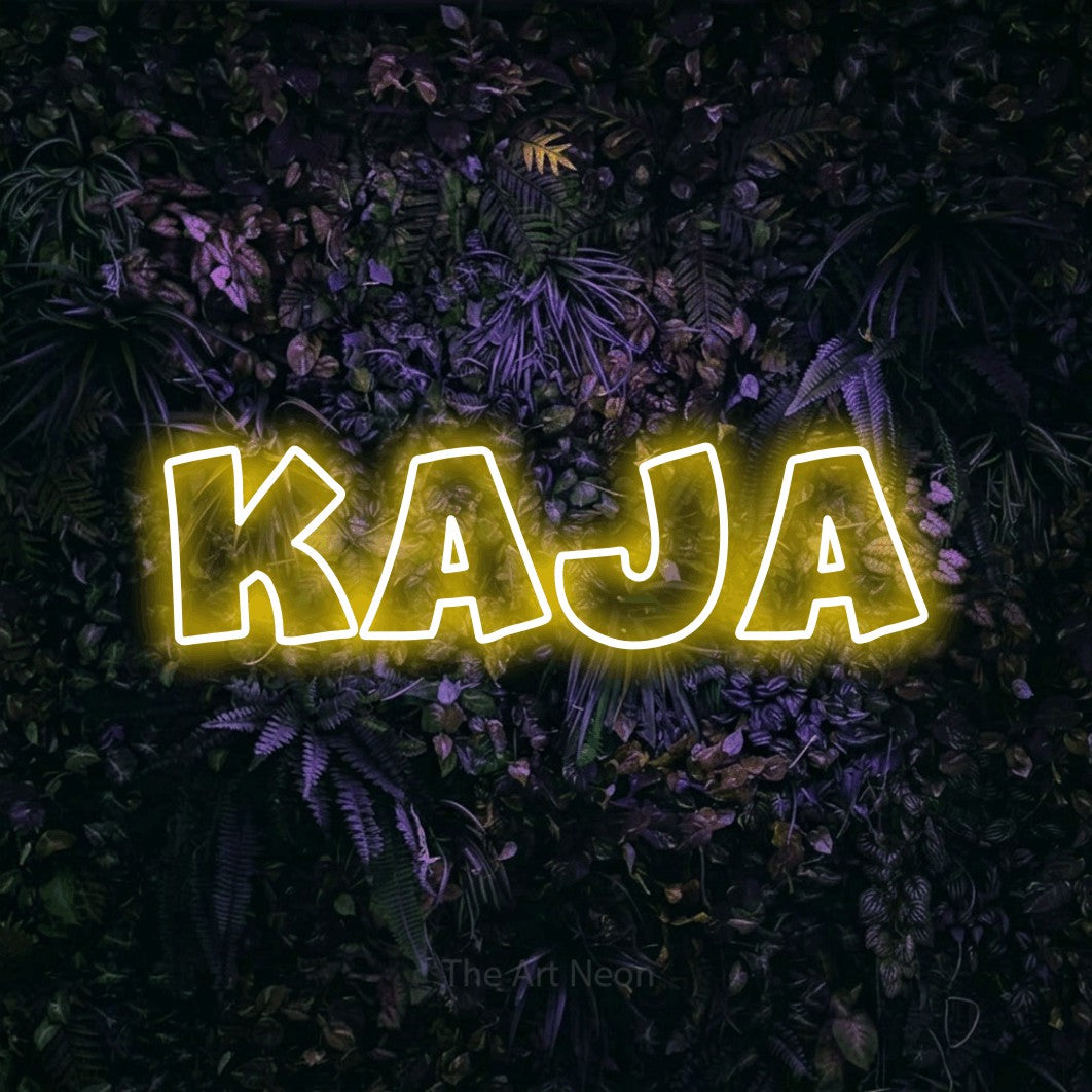 LED neon sign reading “KAJA”, arranged in a single line.