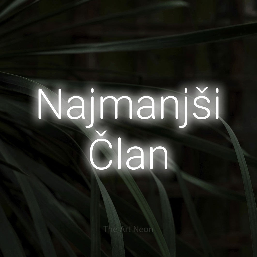 LED neon sign reading “Najmanjši Član”, arranged in two lines.