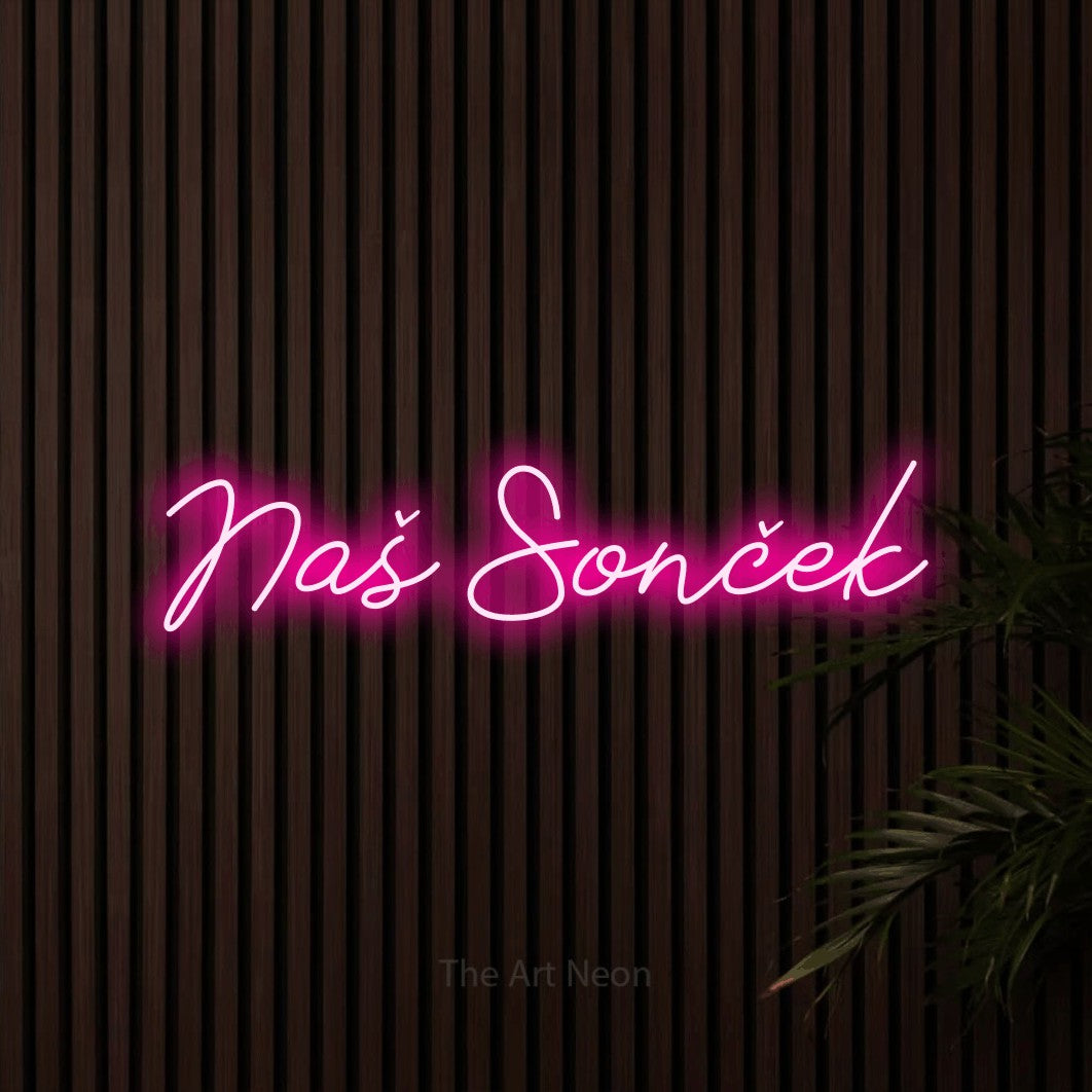LED neon sign reading “Naš Sonček”, arranged in a single line.