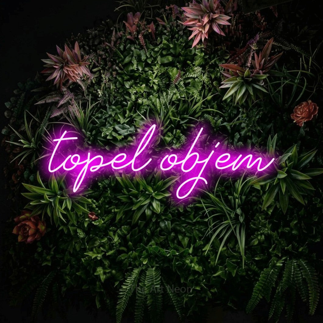 LED neon sign reading “topel objem”, arranged in a single line.