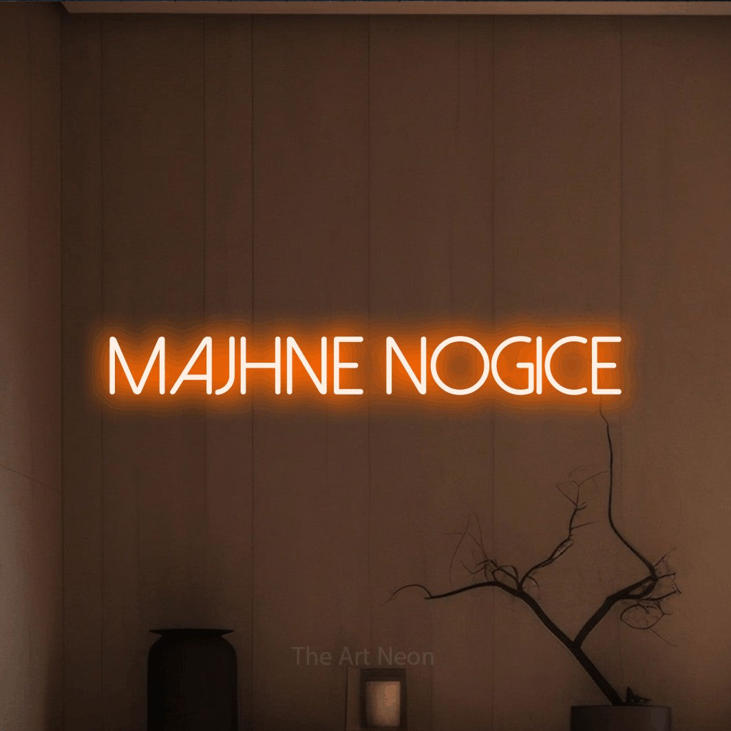 LED neon sign reading “MAJHNE NOGICE”, arranged in a single line.