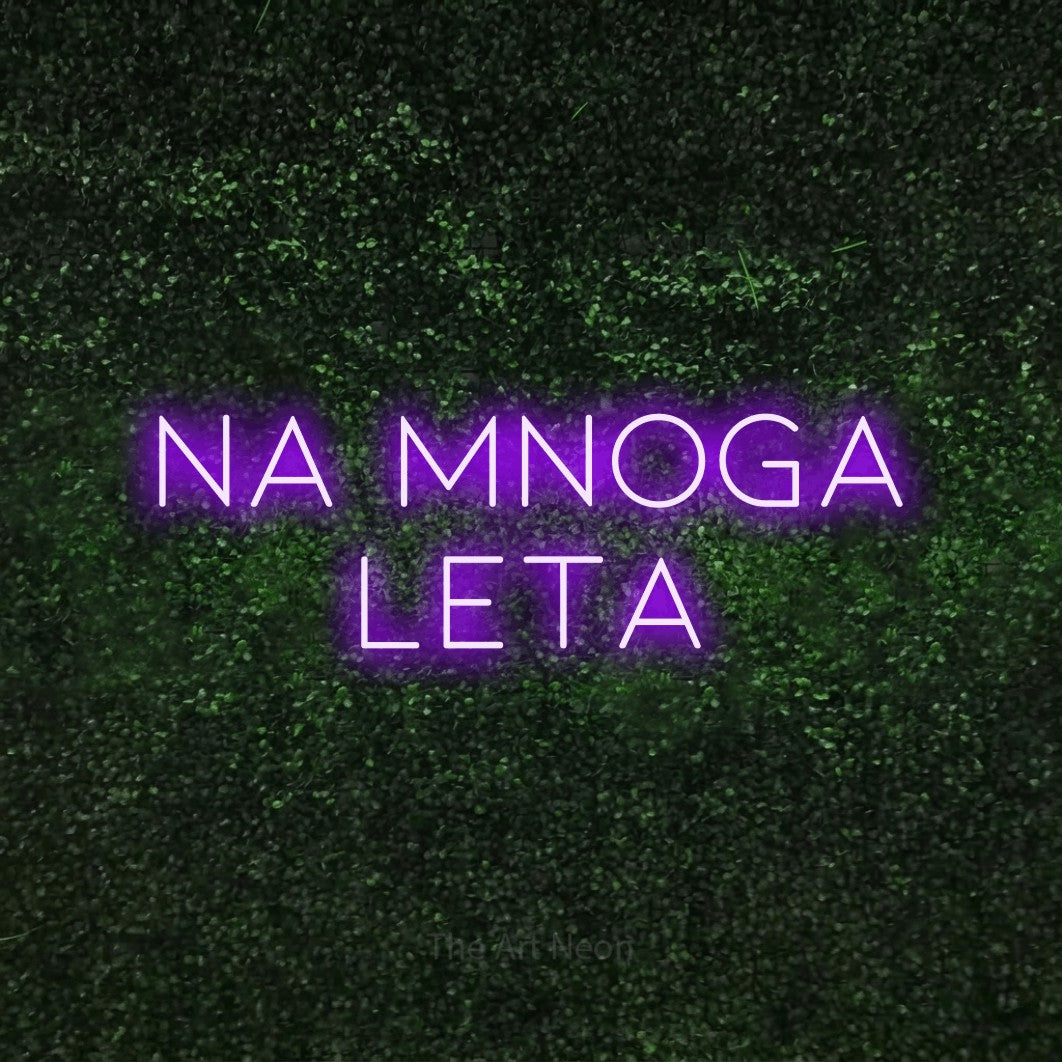 LED neon sign reading “NA MNOGA LETA”, arranged in two lines.