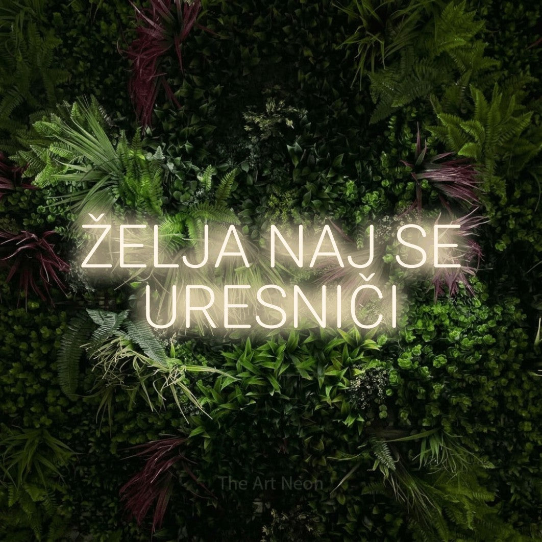 LED neon sign reading “ŽELJA NAJ SE URESNIČI”, arranged in two lines.