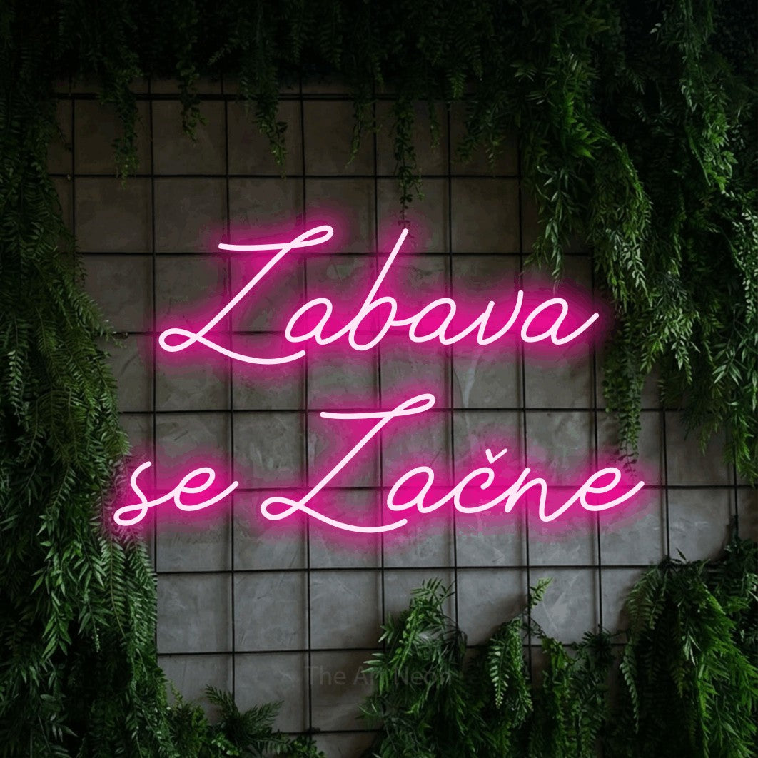 LED neon sign reading “Zabava se Začne”, arranged in two lines.