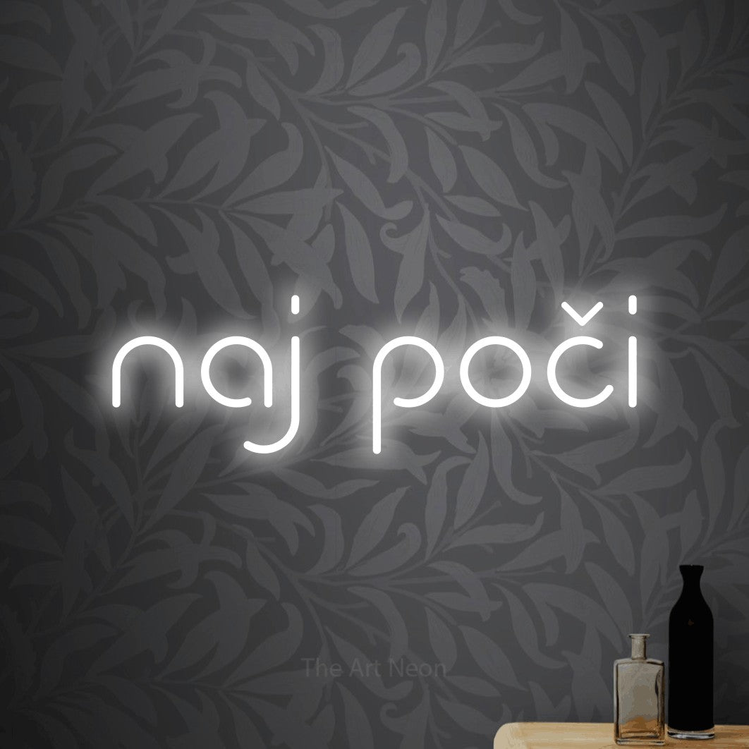 LED neon sign reading “naj poči”, arranged in a single line.