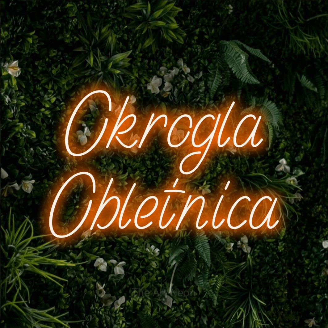 LED neon sign reading “Okrogla Obletnica”, arranged in two lines.